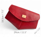 Red leather clutch bag with dimensions labeled on a white background