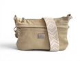 Butter yellow cream  leather crossbody bag with a strap on a white background