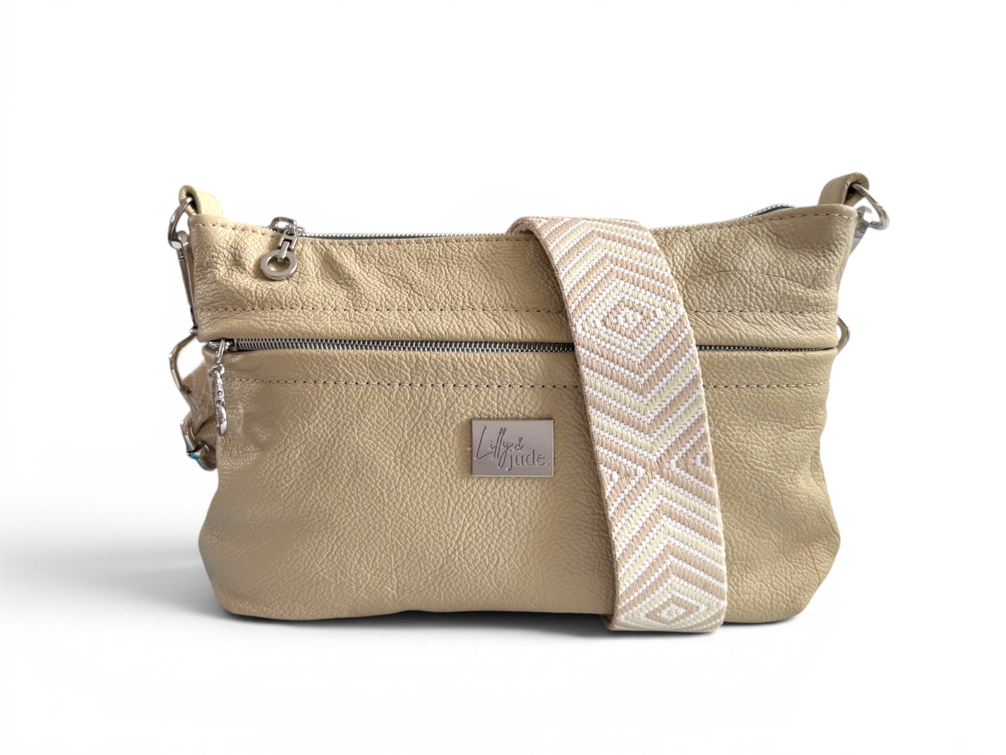Butter yellow cream  leather crossbody bag with a strap on a white background