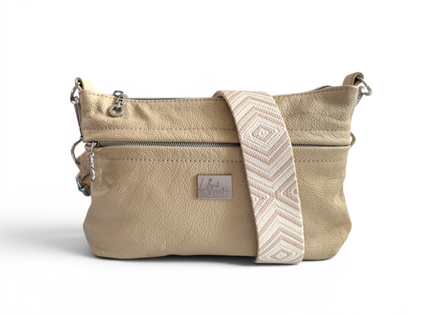 Butter yellow cream  leather crossbody bag with a strap on a white background