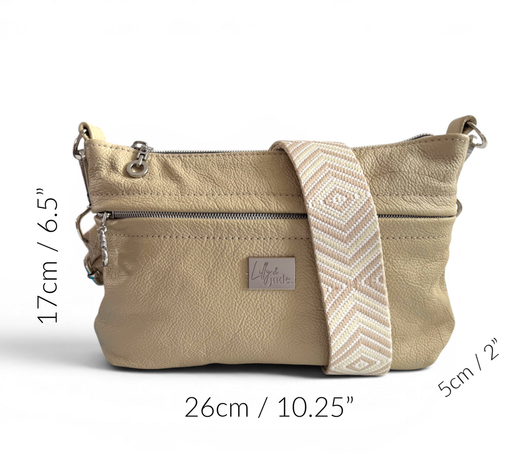 cream, full grain leather handbag with measurements on a white background