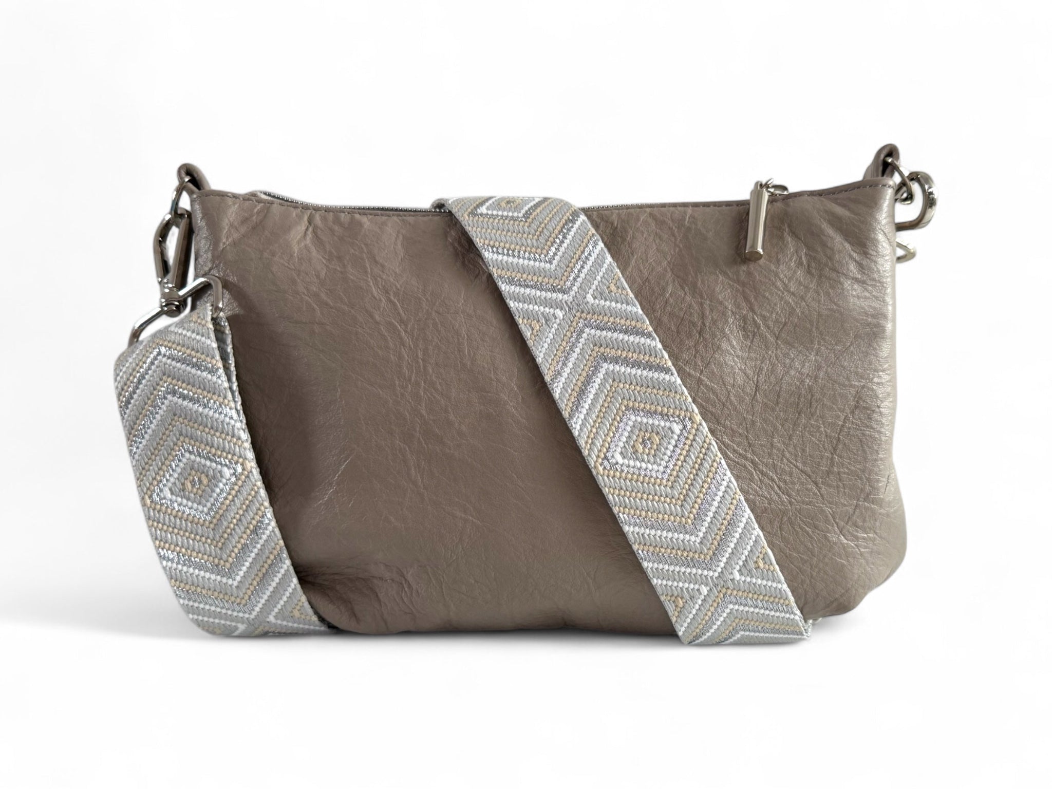 Rear view of the Starburn grey soft leather crossbody bag, with chevron patterned strap