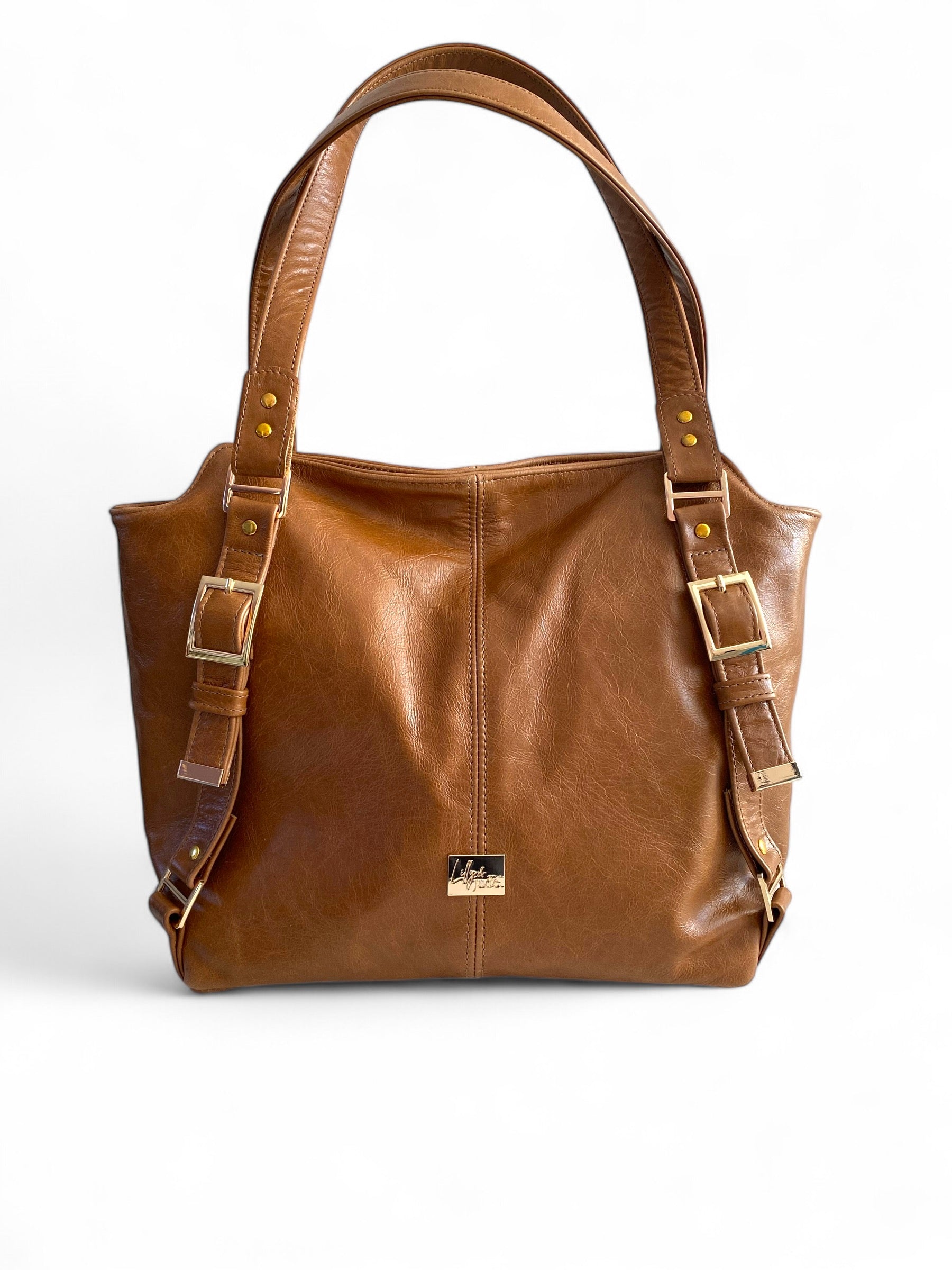 Moonwake tan brown leather slouch tote bag by Lilly & Jude, handcrafted from rescued leather, shown against a white background.